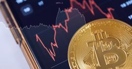 Bitcoin drops below $60,000 triggering almost $875 million in liquidations