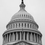 grayscale photo of concrete building