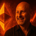 A glowing, fiery Ethereum symbol rises behind Joseph Lubin as he smiles with confidence, bathed in dramatic orange light.