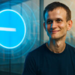 Vitalik Buterin stands smiling in a bright glass atrium with a glowing Base logo behind him, conveying optimism toward Coinbase-backed Base.