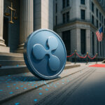 a silver-blue Ripple coin tipped on courthouse steps with blue confetti and a gavel nearby while, down the block, a red-carpeted Wall Street entrance and the bronze bull sit out of focus, implying victory yet distance from the financial hub.
