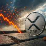 A large silver XRP coin stands on cracked pavement under stormy skies as a bright red downward trend line glows in the background, symbolizing XRP’s on-chain activity spike amid collapsing market sentiment.