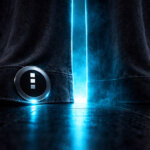 Midnight blockchain token glowing beneath a partially opened curtain, symbolizing a planned March 2026 launch, a $1.22 trillion privacy gap, and questions about delivering real-world applications