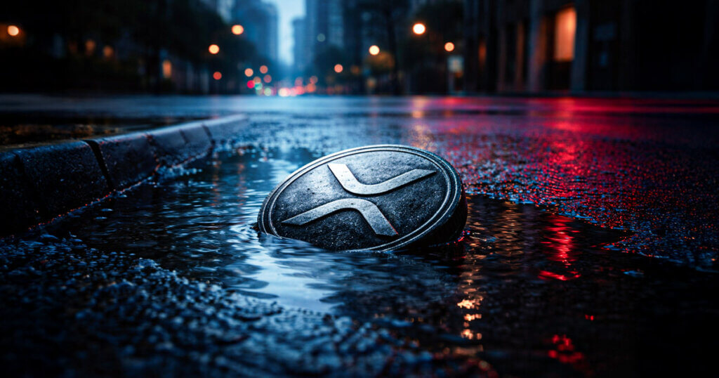 XRP coin partially submerged in a rain-soaked city street at night, symbolizing over $50 billion in unrealized losses for XRP holders