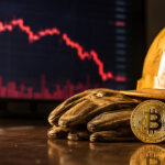 Bitcoin mining gear and a falling market chart symbolize how strong employment data can pressure Bitcoin prices by reducing expectations for interest rate cuts.