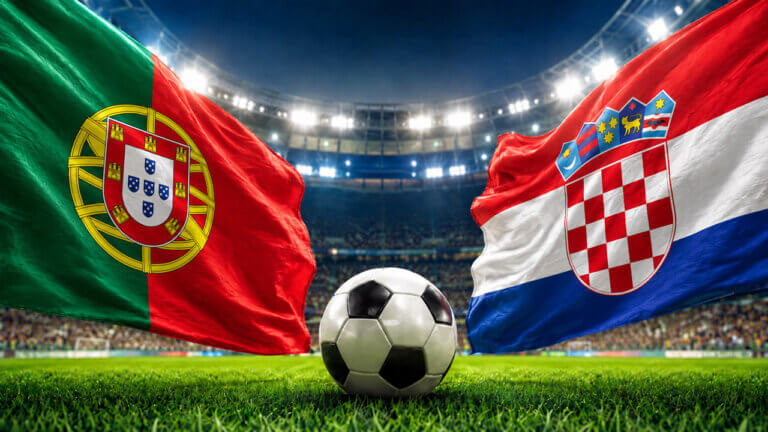 Portugal and Croatia flags face off above a soccer ball in a packed stadium, representing a FIFA World Cup prediction market matchup.