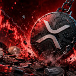 Cracked XRP logo surrounded by red shards symbolizing crypto market selloff and investor capitulation.