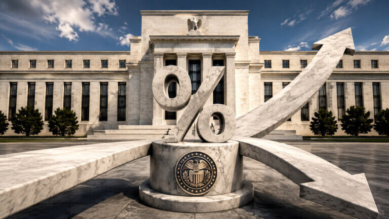Marble percent symbol with rising and falling arrows outside the Federal Reserve building, representing a September interest rate decision.