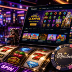 Cinematic Rainbet casino hero image showing a branded chip beside a tablet interface and colorful slot machines in a neon-lit casino setting.