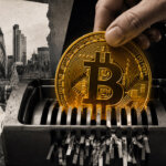 Editorial collage showing a realistic hand lowering a large gold Bitcoin into an industrial paper shredder, with torn London landmarks, magenta trading-room imagery, and a declining market chart in the background.